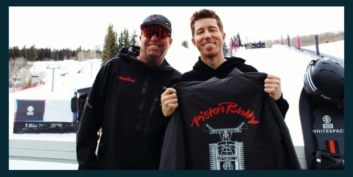 Three models wearing a backpack, a sunshirt, and a tank top from PistenBully.