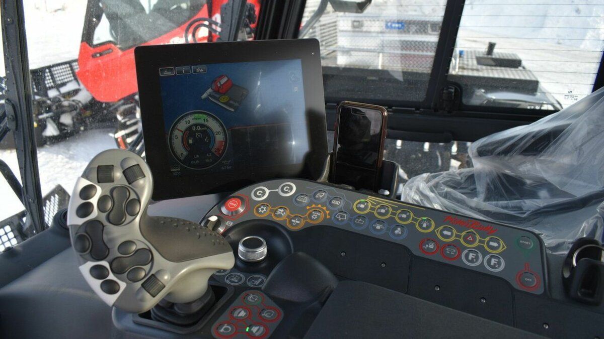 Armrest in the cockpit of a PistenBully 100 TrailPro