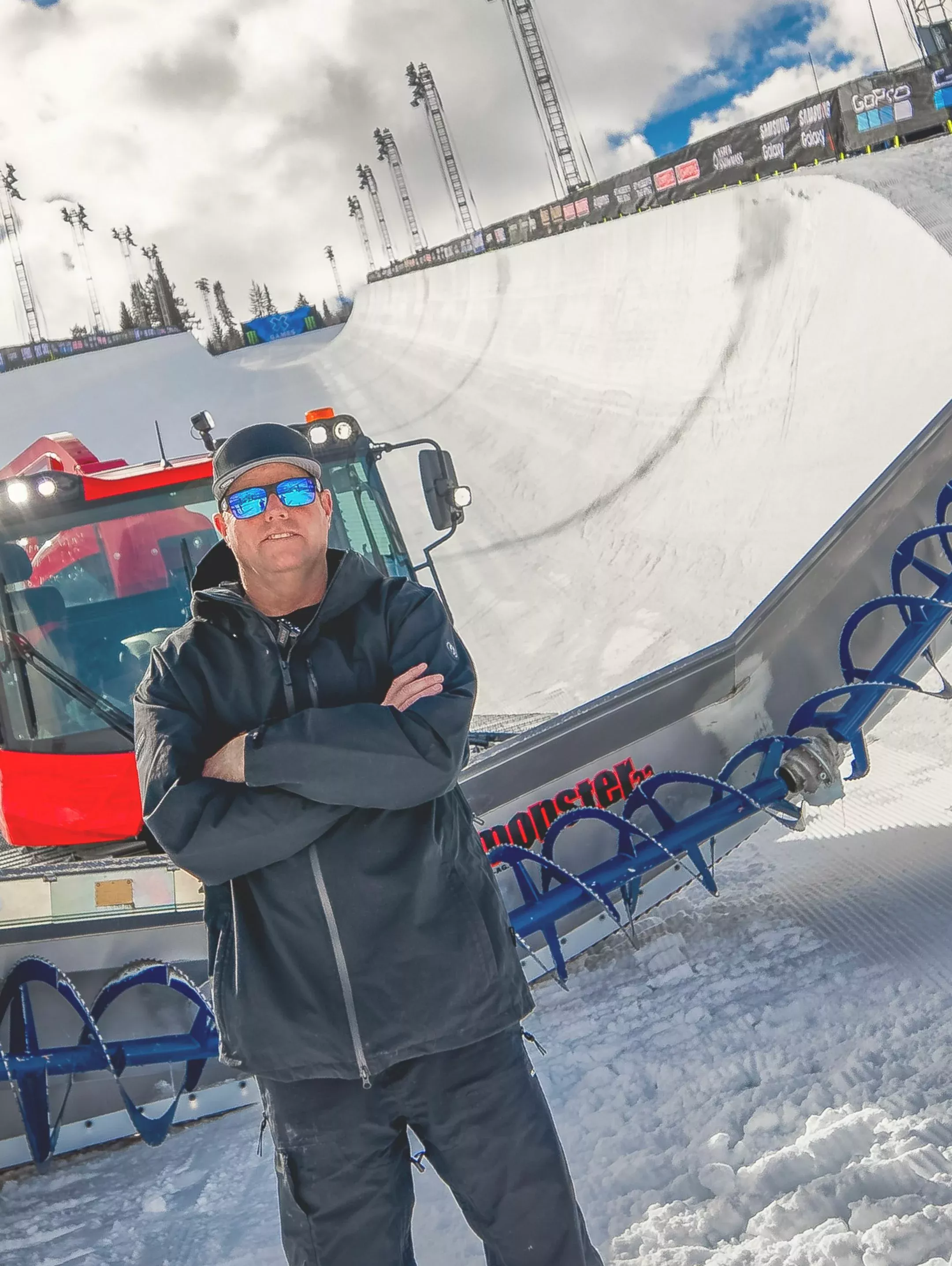 Frank Wells Frank Wells in front of his PistenBully at X Games.