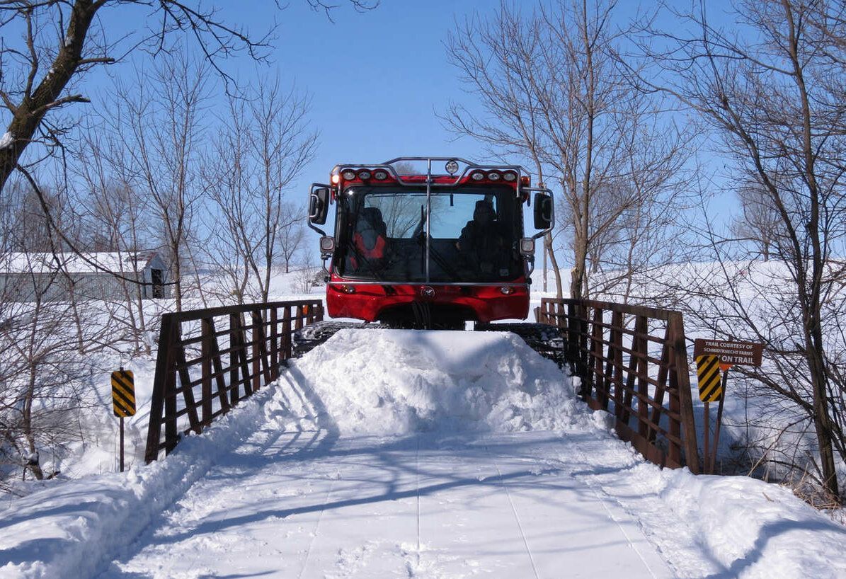 PistenBully 400 Trail on a bridge