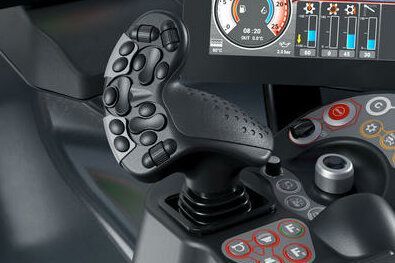 The joystick in the  cockpit of the PistenBully 800.