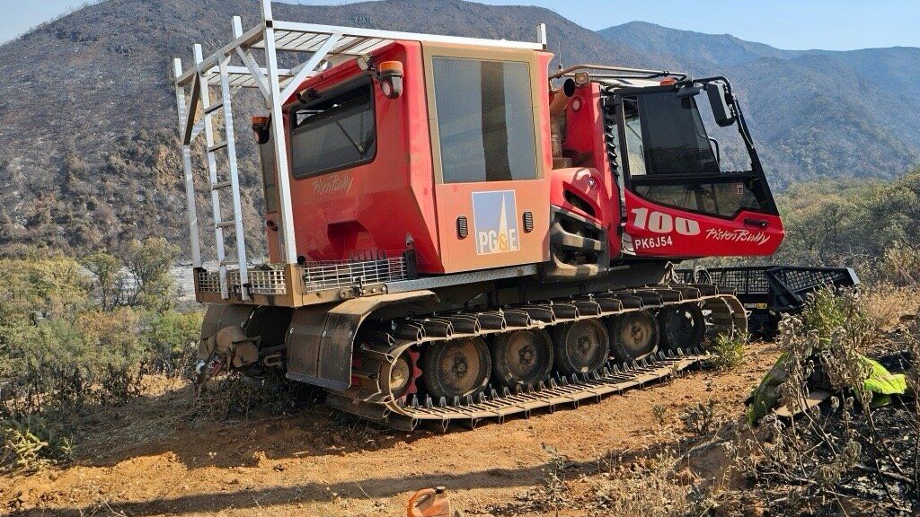 A PistenBully 100 doing firefighting work for customer PG&E.