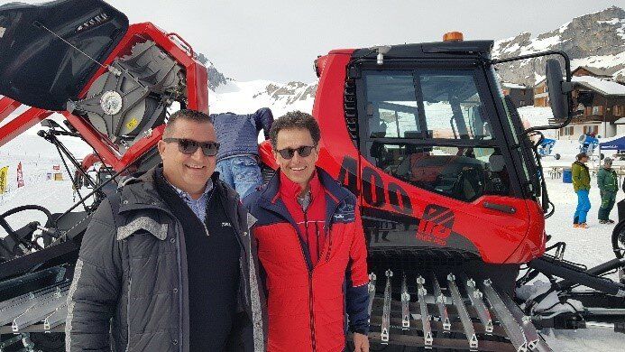 Remo and Thilo in front of a PistenBully