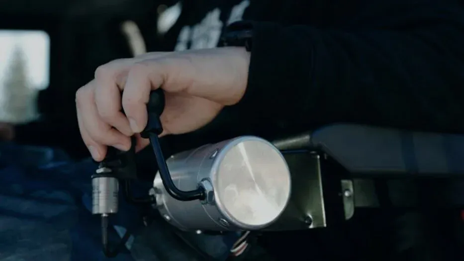 A Service Tech working on a machine.